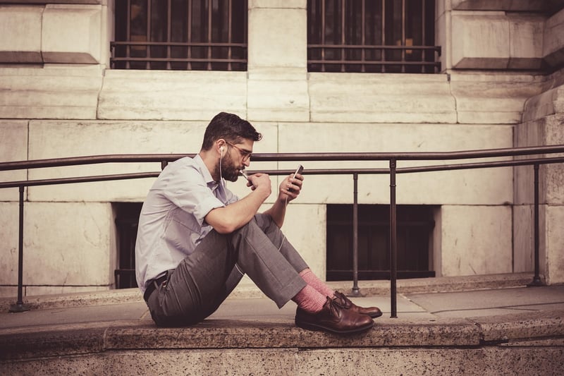 Businessmen talking on smartphone